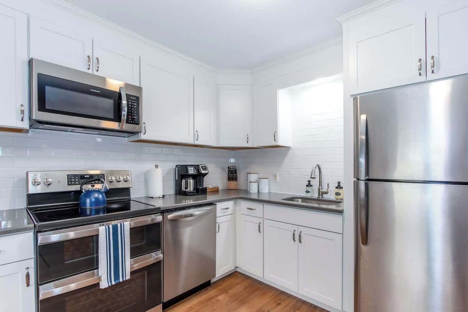 Step into a freshly renovated kitchen with a sleek, modern design! Fully stocked and featuring brand-new appliances, it’s perfect for cooking up delicious meals with ease.
