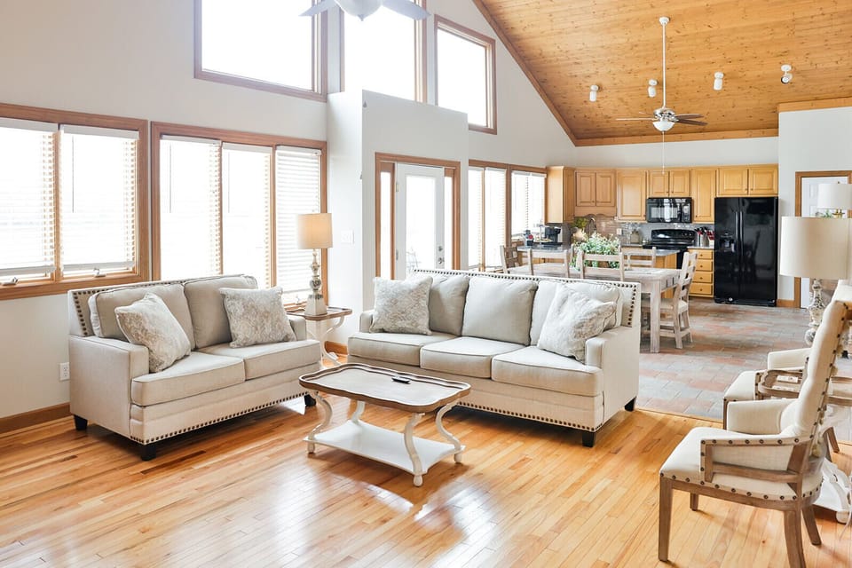 Plenty of natural light w/ all the windows with an unobstructed view of the lake