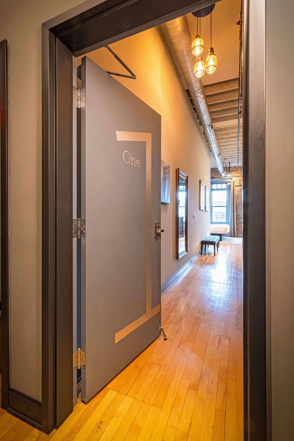 Loft One. Your door, your space - accessed directly from the building's private corridor.