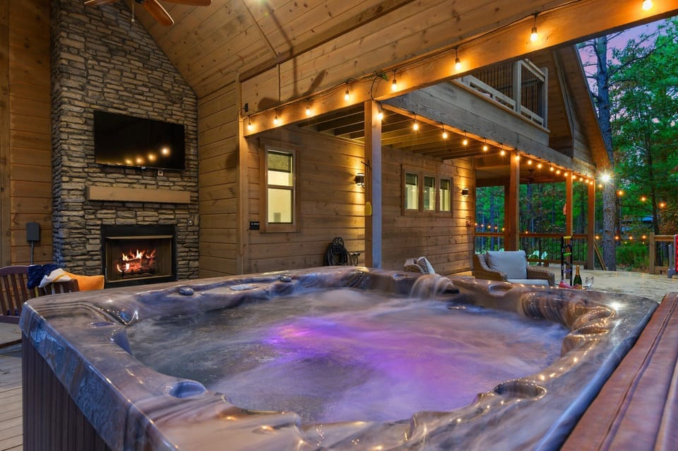 Relax in the hot tub after a day of hiking with a fire