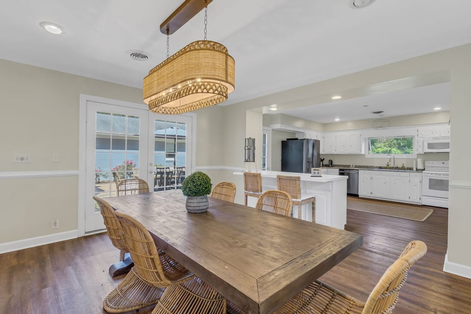 Dining room opens to kitchen and outdoor courtyard
