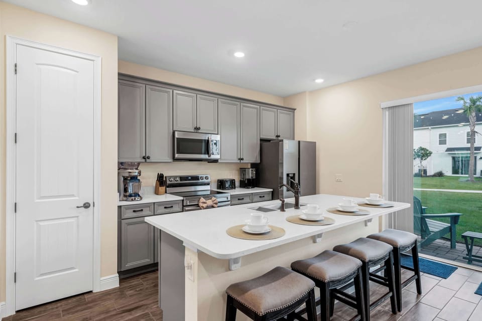 Townhome, Multiple Beds, Patio, Garden View (Caribbean Dreamin) | Private kitchen | Fridge, microwave, oven, stovetop