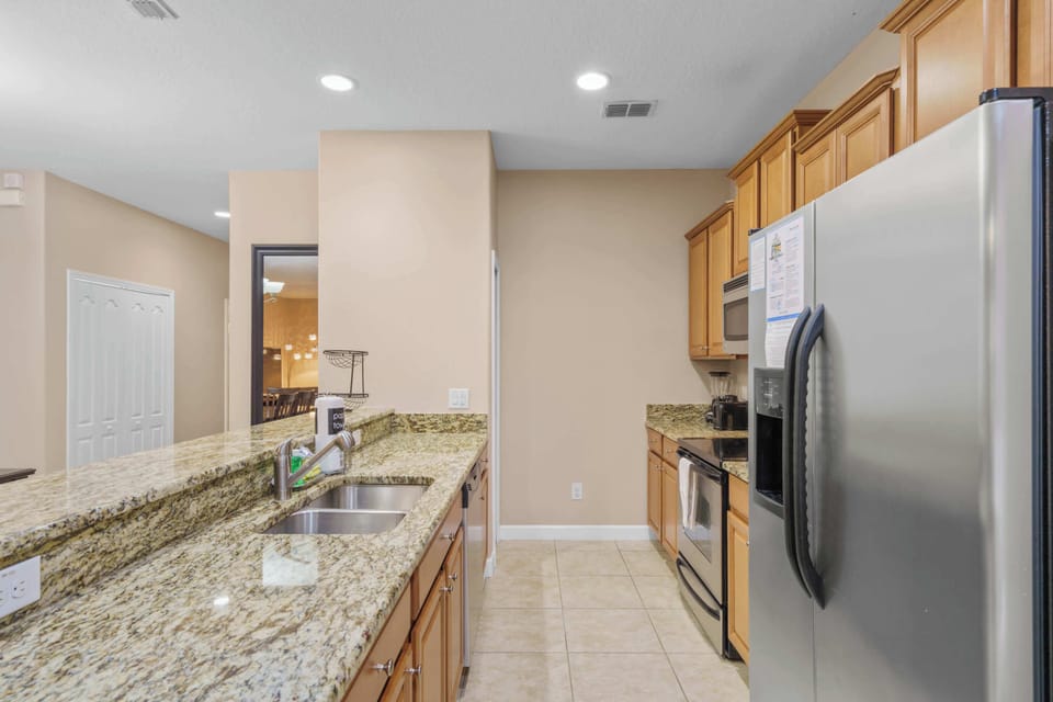 Townhome, Multiple Beds, Pool Access, Garden View (Main Street in Paradise Palms) | Private kitchen | Fridge, microwave, oven, stovetop