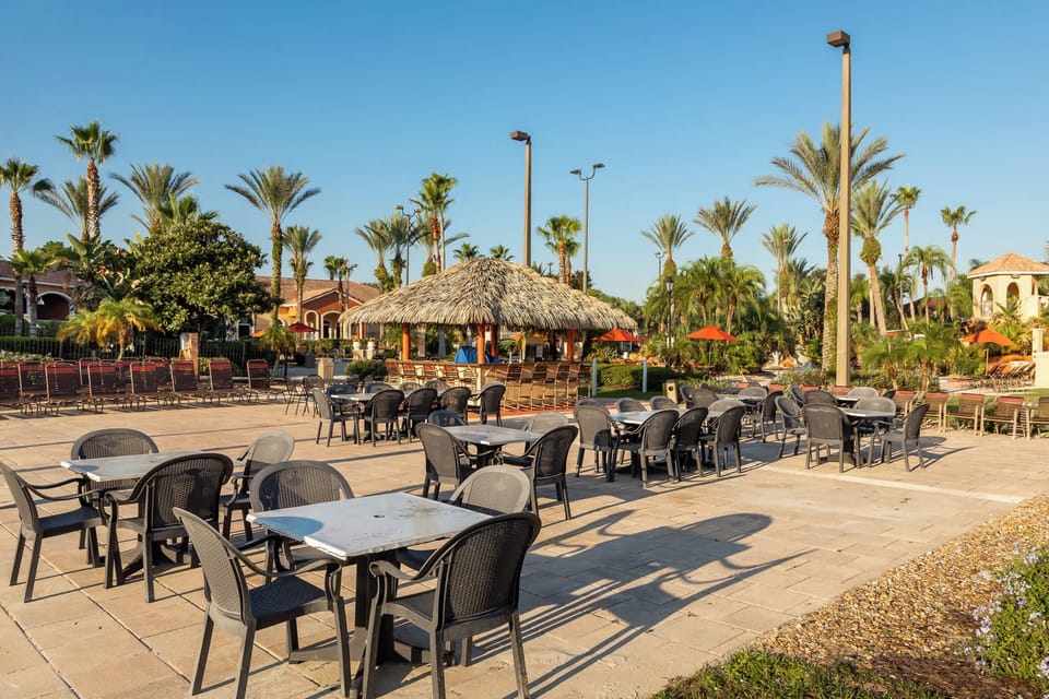 Townhome, Multiple Beds, Pool Access, City View (Endless Summer at Regal Palms) | Outdoor dining