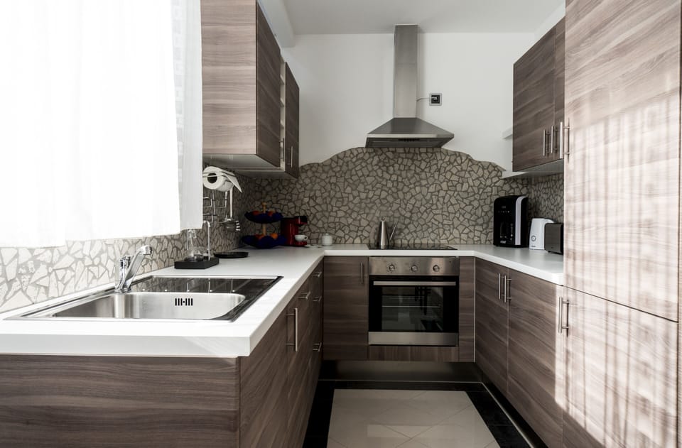 Apartment, 1 Bedroom | Private kitchen | Coffee/tea maker, fridge, microwave, dishwasher