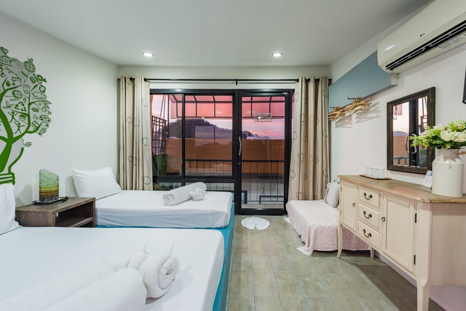 Basic Triple Room | Individually decorated, blackout drapes, free WiFi, bed sheets