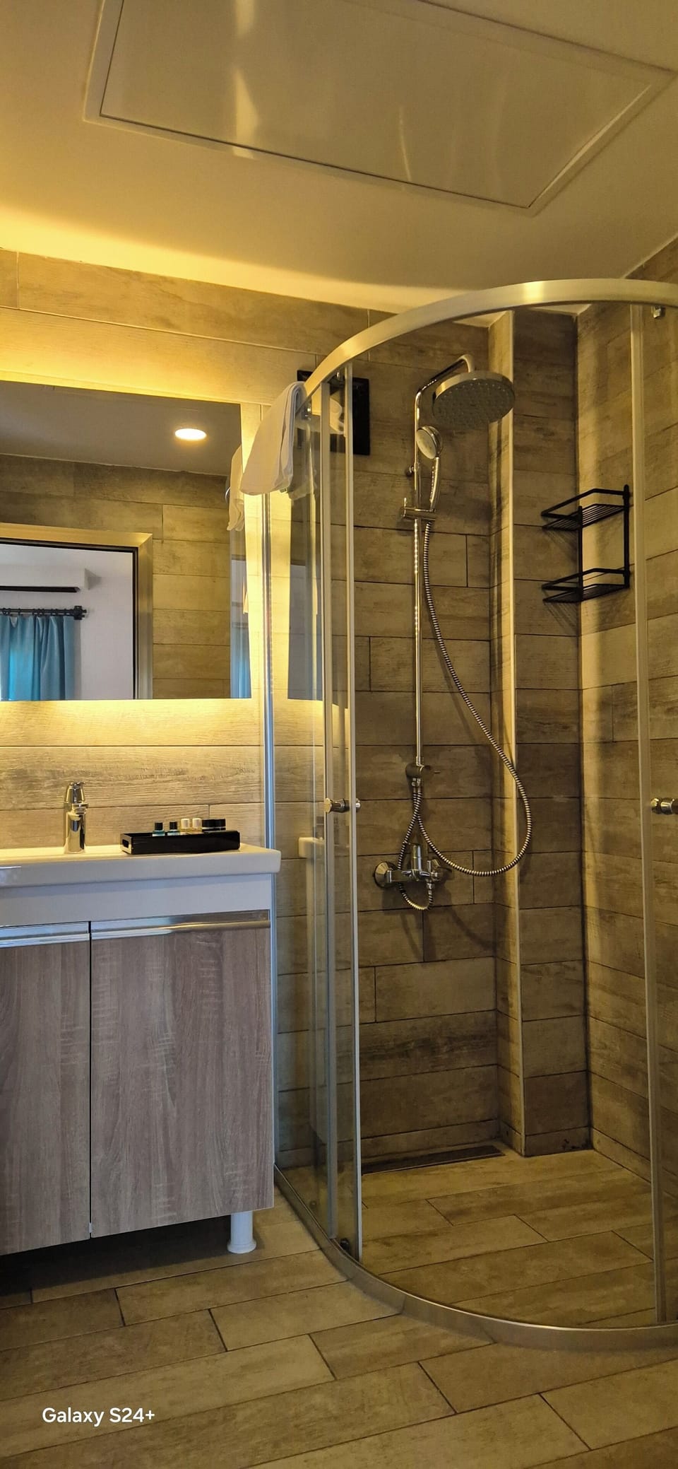 Shower, free toiletries, hair dryer, slippers