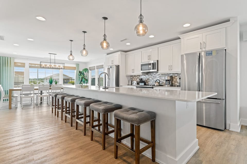 Kitchen with Bar Stool Seating on Third Level