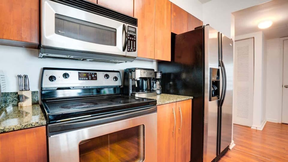 Fully equipped kitchen with complete set of cookware