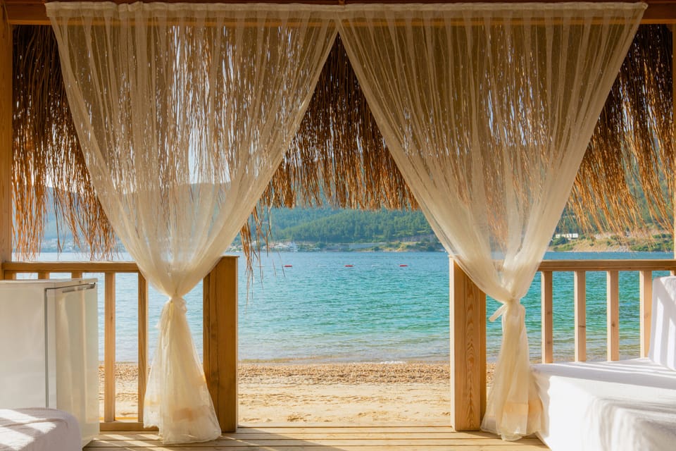 On the beach, sun loungers, beach umbrellas, beach bar
