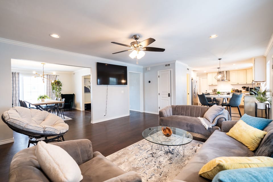 Open living space with a 75" Smart TV.
