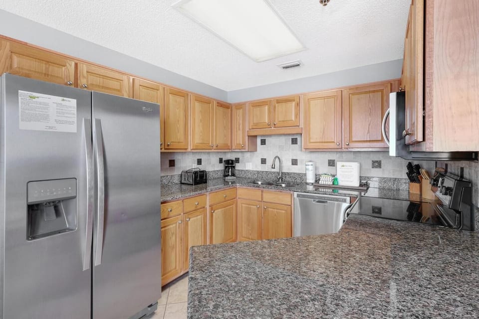 The fully equipped kitchen has everything you need to whip up delicious meals during your stay.