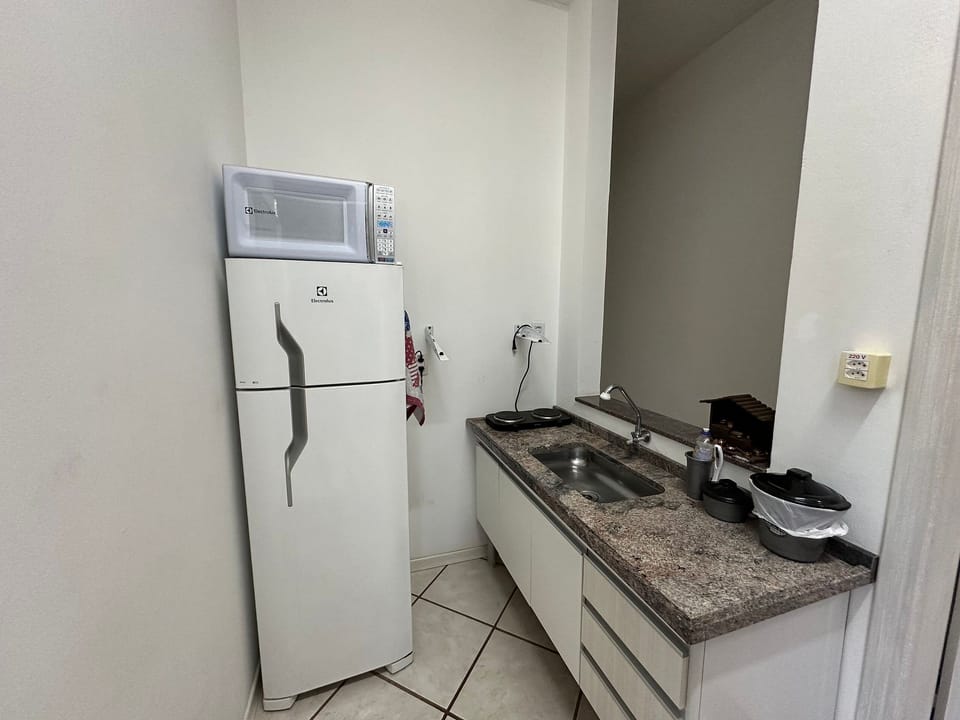 Apartment | Private kitchen | Fridge, microwave, coffee/tea maker, cookware/dishes/utensils