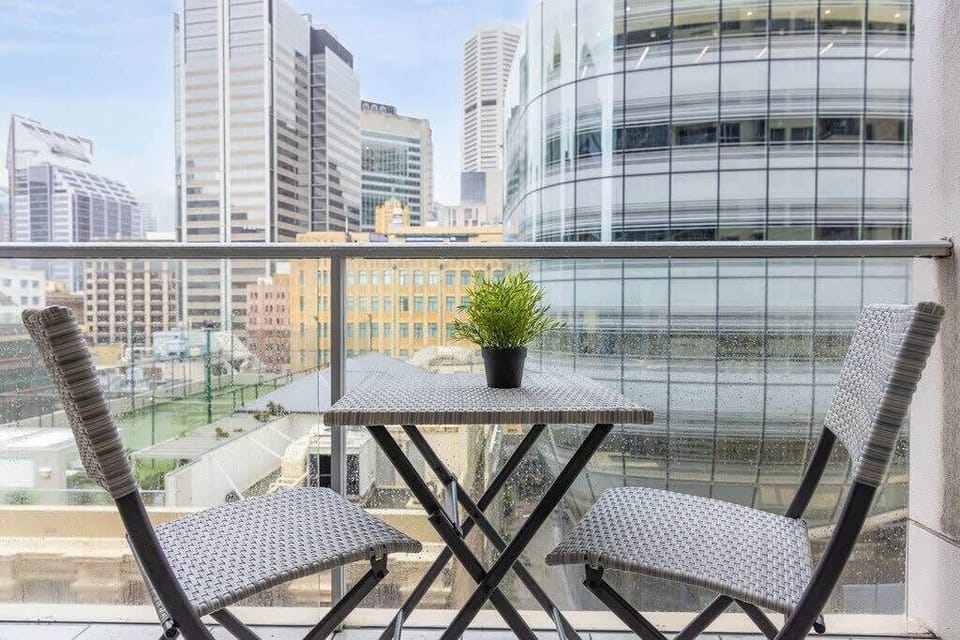 A balcony with city views.