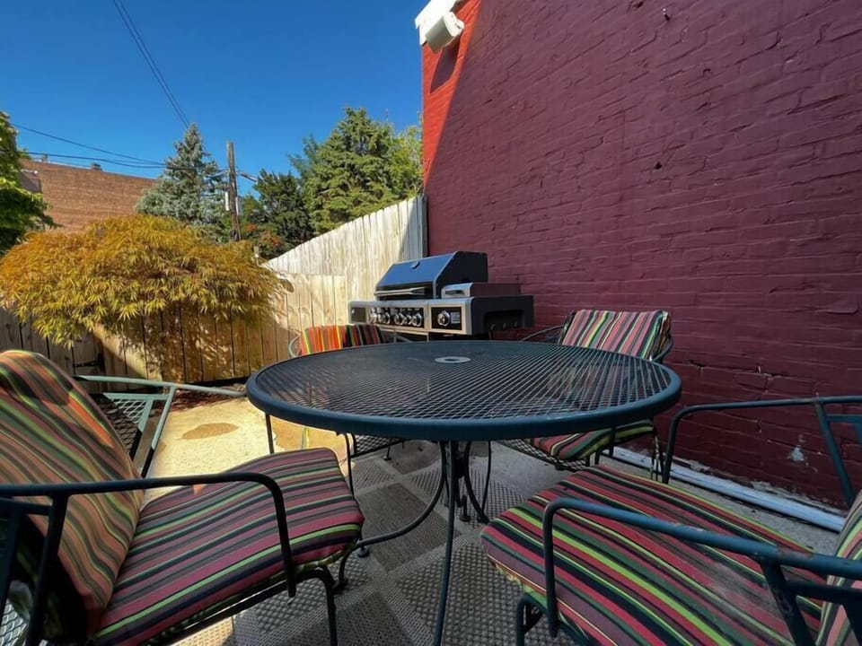 Shared outdoor patio with gas grill