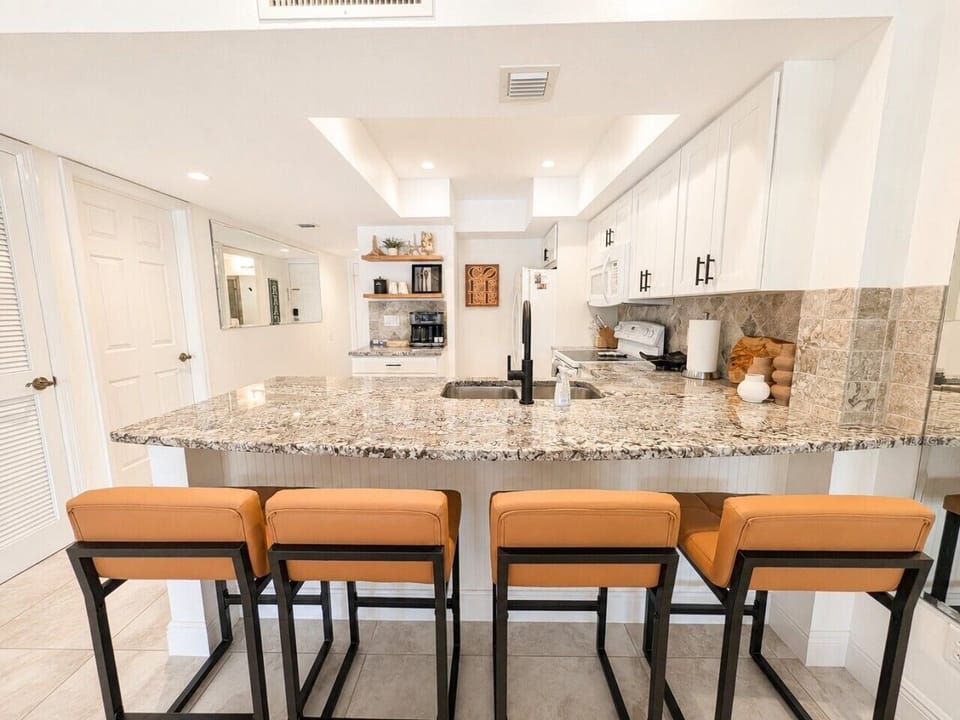 Pull up a seat at the spacious kitchen bar.