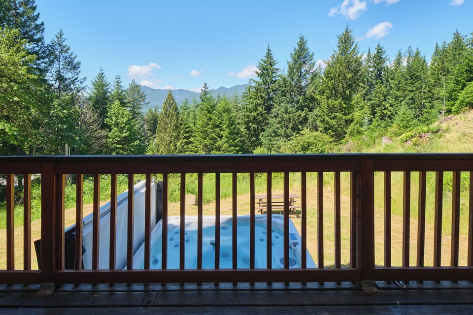 Indulge in ultimate relaxation as you soak in our luxurious hot tub, surrounded 
