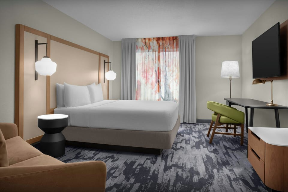 Premium bedding, desk, blackout drapes, iron/ironing board