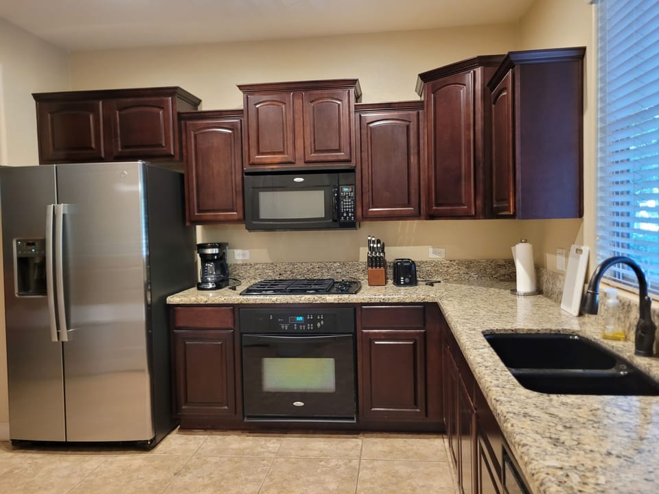The kitchen is fully stocked with everything you need.