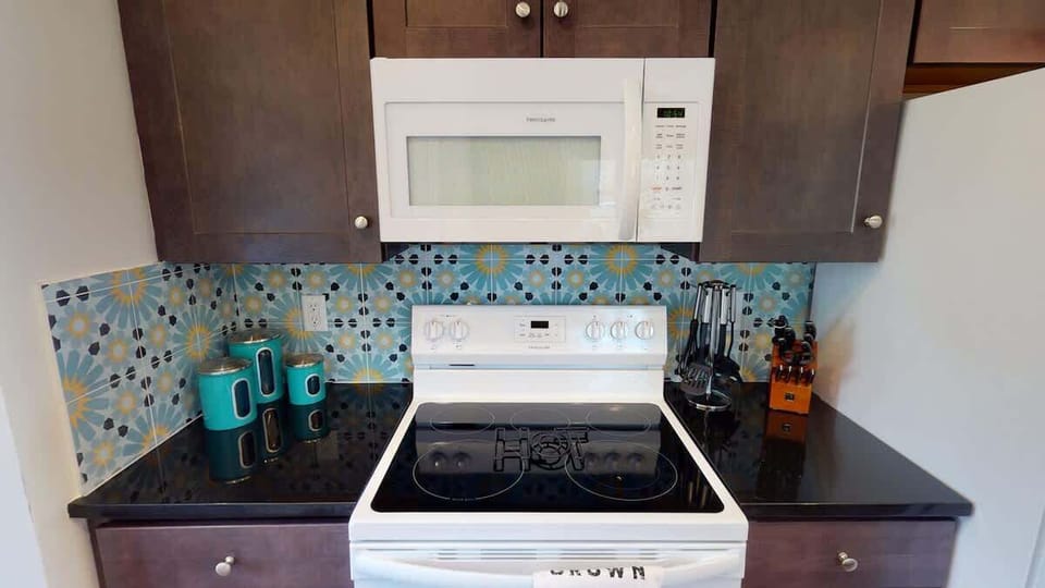 You’ll have all the standard appliances – refrigerator, stove/oven, microwave, dishwasher – and a useful selection of small-kitchen appliances.