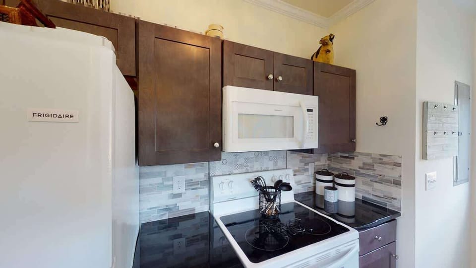You’ll have all the standard appliances – refrigerator, stove/oven, microwave, dishwasher – and a useful selection of small-kitchen appliances.