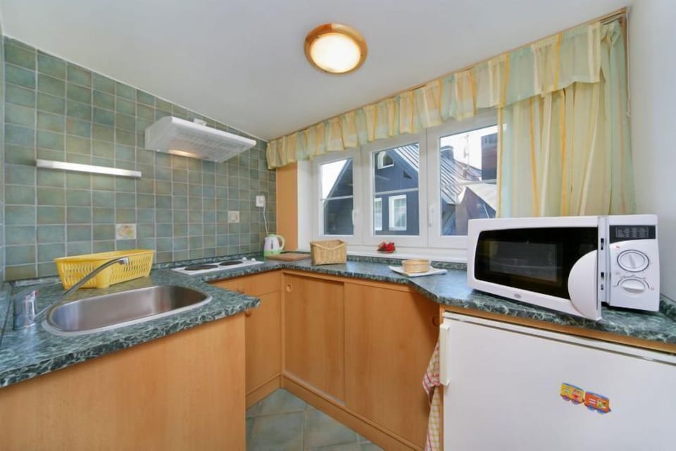 Family Apartment, 2 Bedrooms | Private kitchenette | Fridge, electric kettle