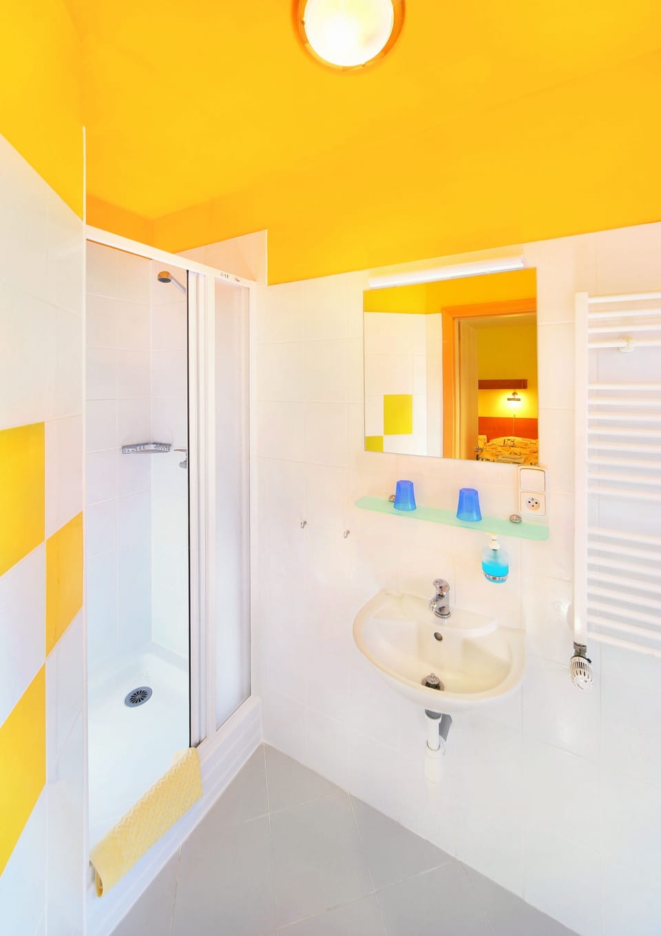 Shower, rainfall showerhead, towels, soap