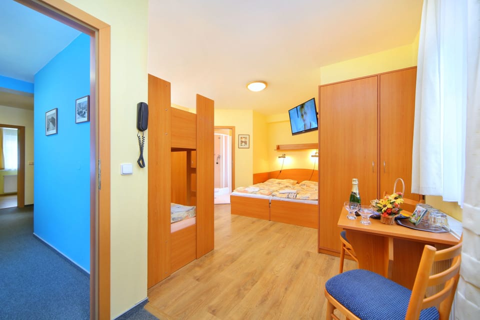 Family Room | Blackout drapes, cribs/infant beds, free WiFi, bed sheets