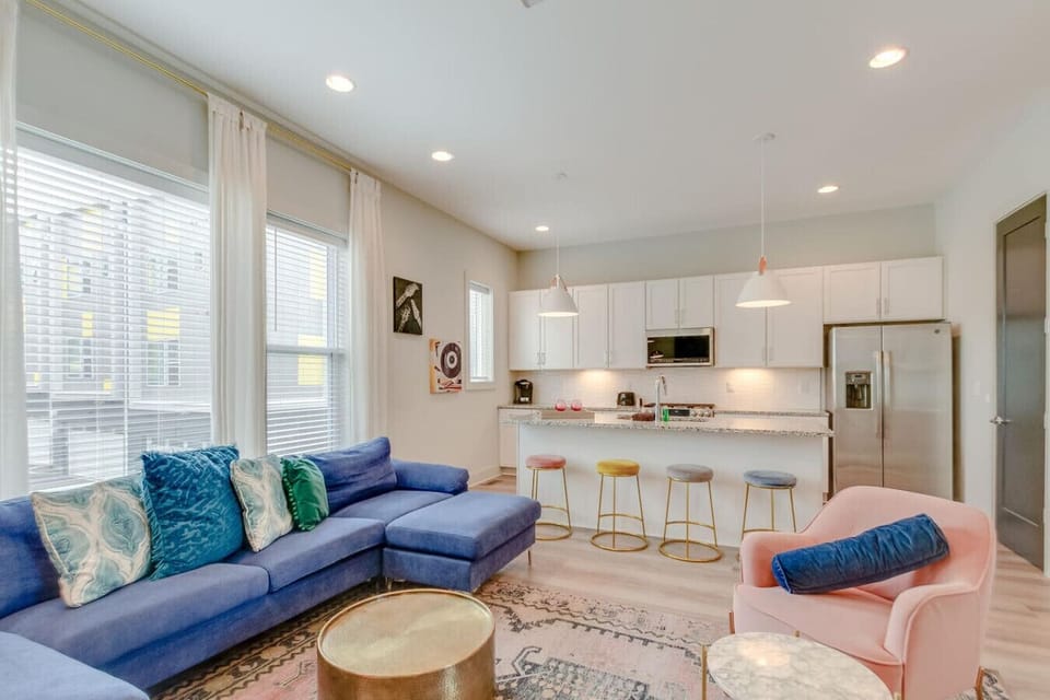 The open living room and full kitchen with island bar seating make this level incredibly functional.
