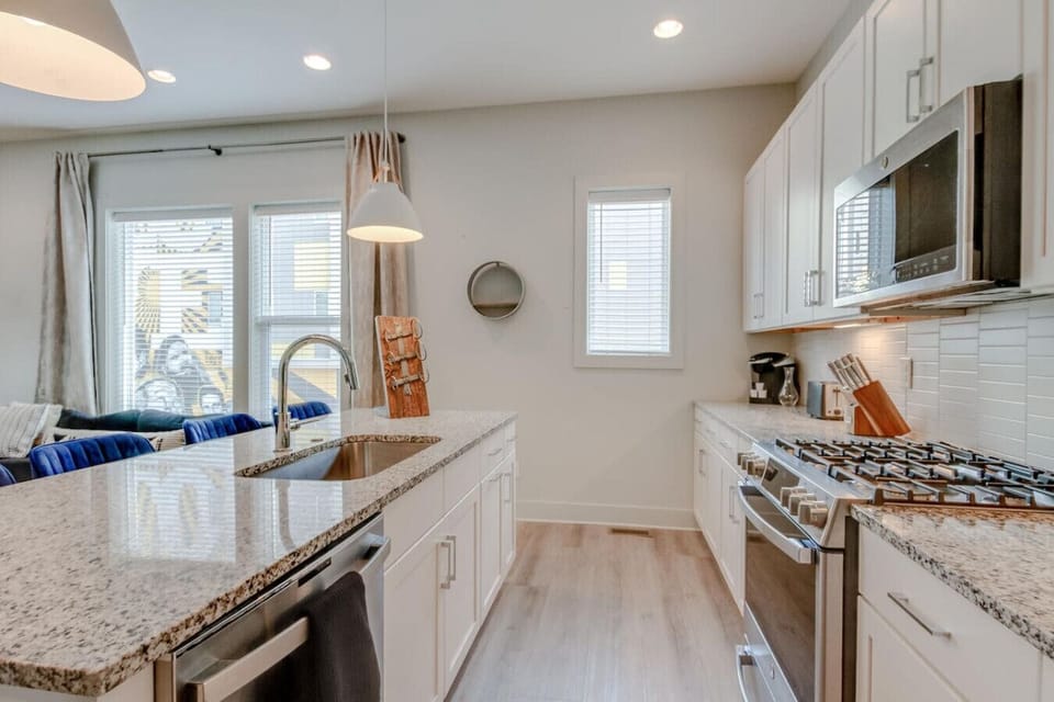 A spacious kitchen is stocked and ready for any meal you want to prepare during your stay.