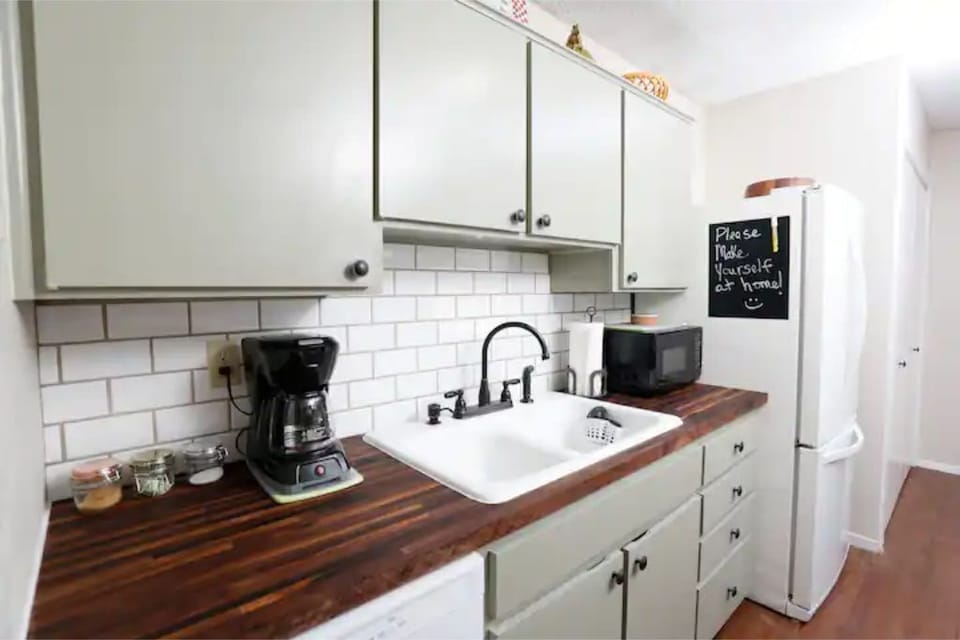 Coffee Pot, Microwave, Refrigerator with Ice Maker - Full Size Washer and Dryer 