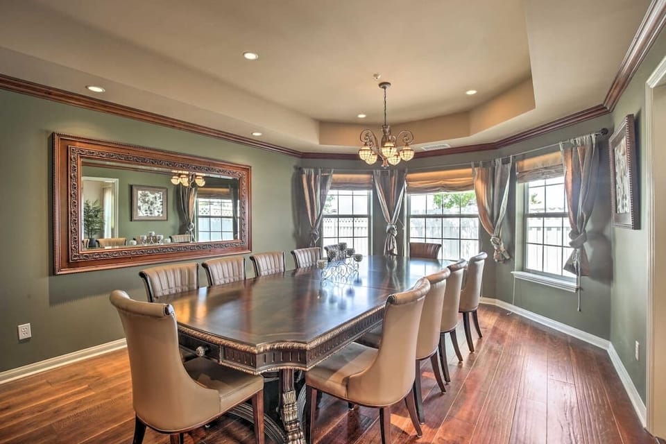 Host dinner in style in this regal bay-windowed dining room!