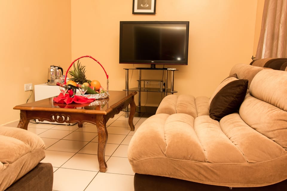 Executive Suite | Living area | Plasma TV