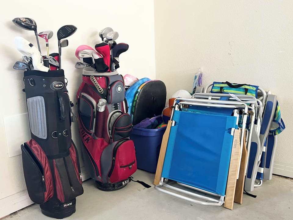 Golf Clubs for your use, beach chairs, and beach toys