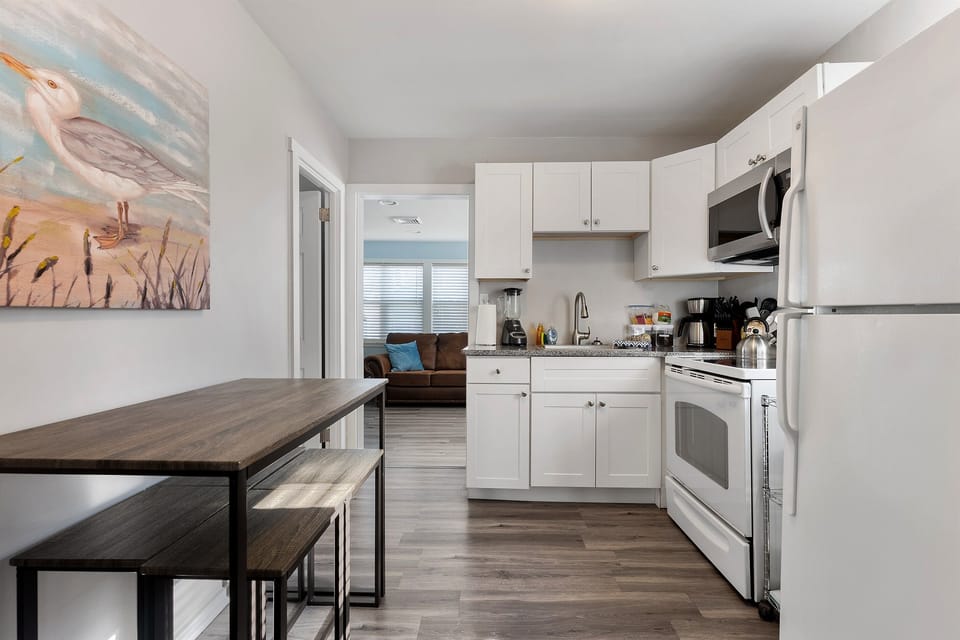 "Grab a quick bite or plan your beach day at the dining bar just off the kitchen."