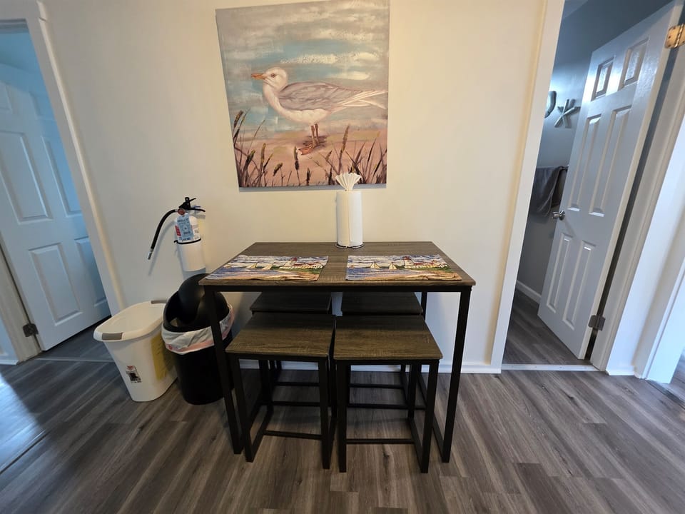 "Multi-purpose dining space doubles as a great laptop-friendly work area."