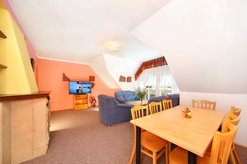 Deluxe Duplex | Living room | LCD TV