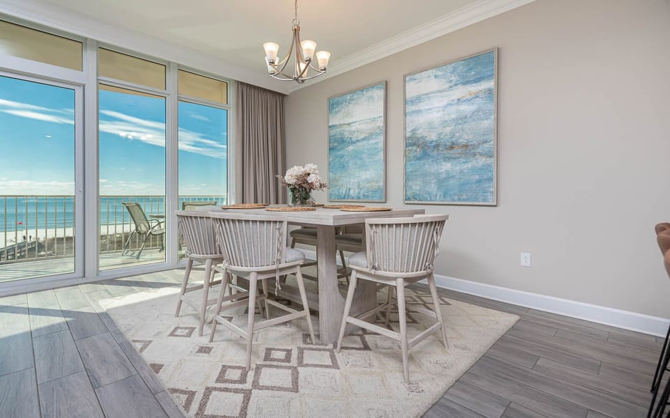 Gather around the stylish dining table and enjoy laughter and conversation with loved ones, while enjoying coastal views