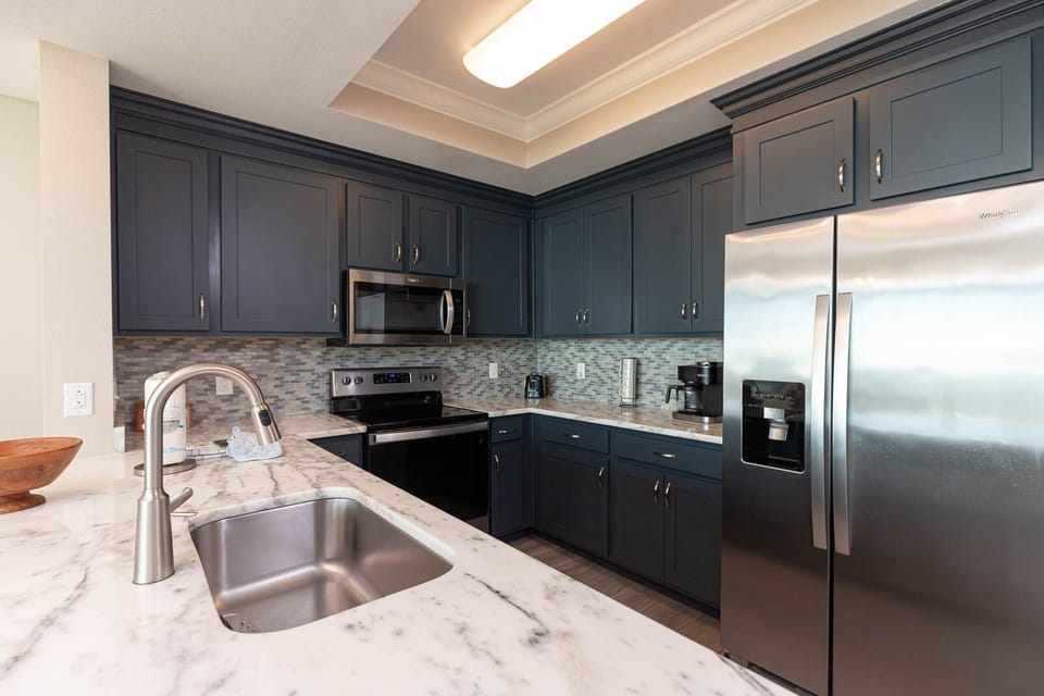 Craft delicious meals in this stylish kitchen, where an elegant design awaits your culinary adventures