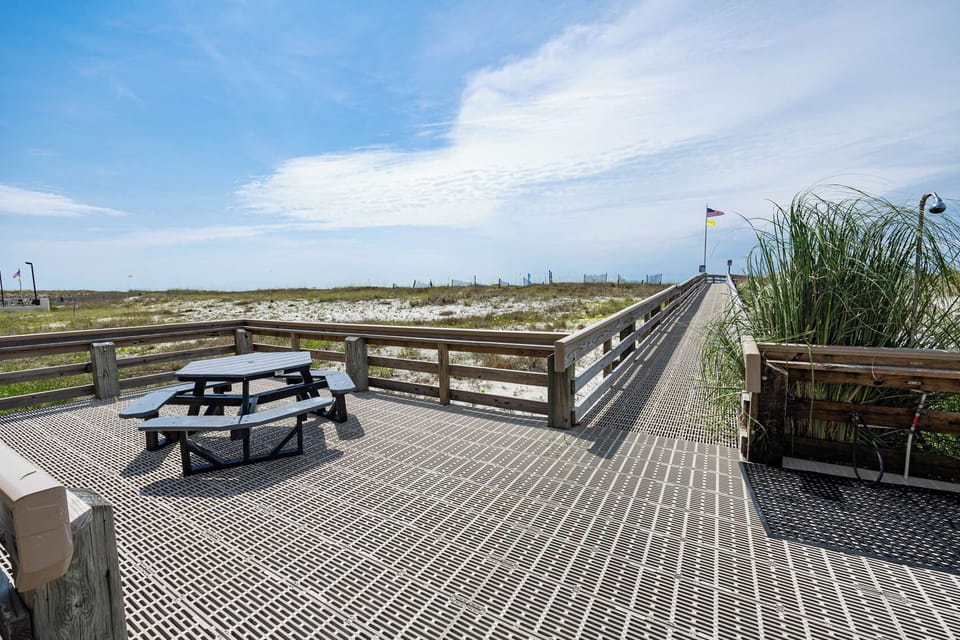 The property boardwalk at Island Winds West awaits you to enjoy the vacation of a lifetime filled with fun beach adventures