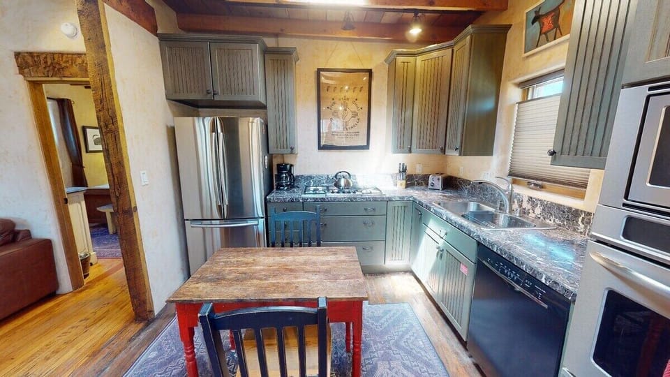 Updated kitchen with gas stove top and granite counter space