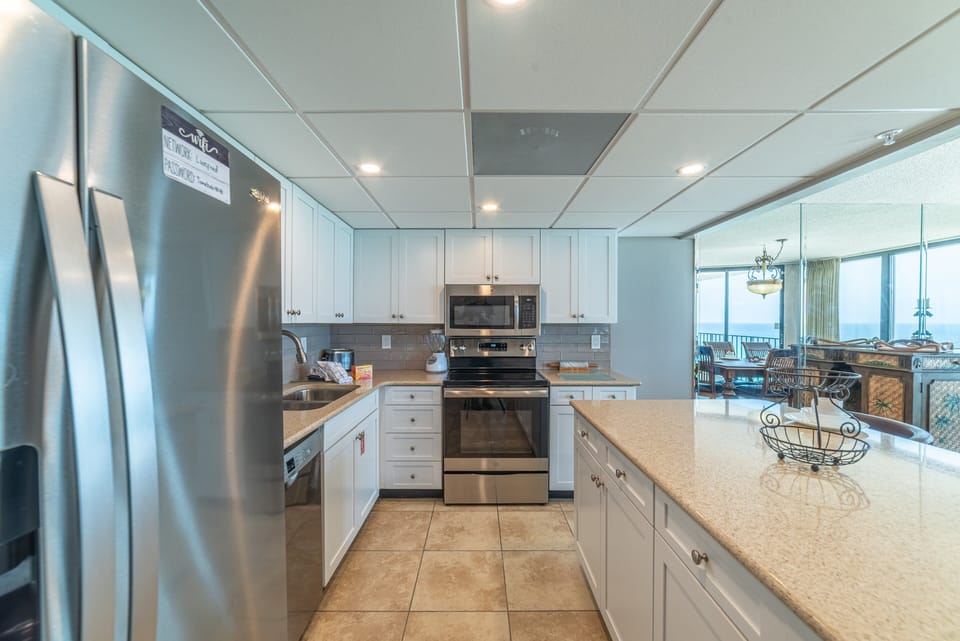 Updated counters and cabinetry in this gourmet kitchen