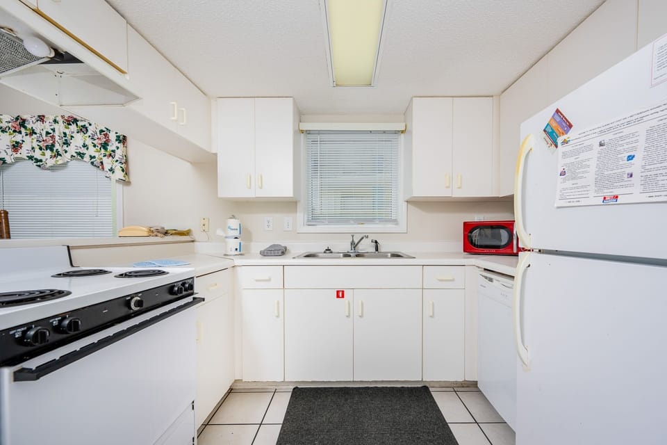 Condo, 2 Bedrooms | Private kitchen | Coffee/tea maker, fridge, oven