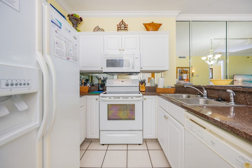 Condo, 2 Bedrooms | Private kitchen | Coffee/tea maker, fridge, oven