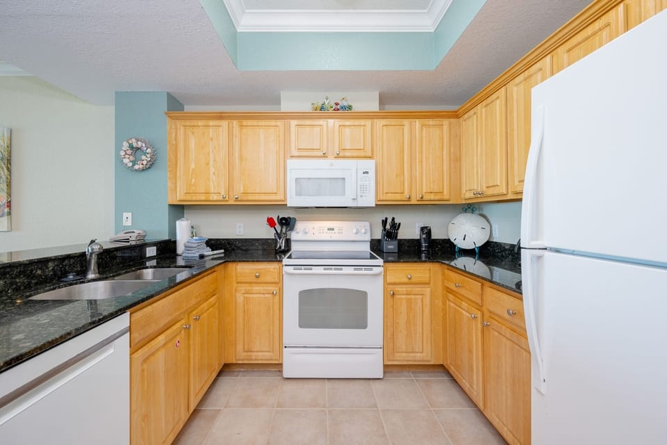 Condo, 2 Bedrooms | Private kitchen | Coffee/tea maker, fridge, oven