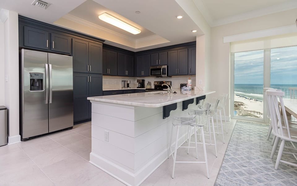 Condo, 4 Bedrooms | Private kitchen | Fridge, oven, coffee/tea maker