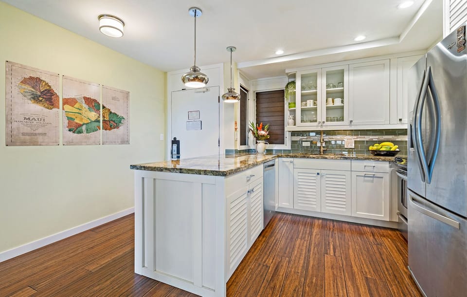 Kitchen - Kitchen with a full-sized microwave, stove, oven, and dishwasher