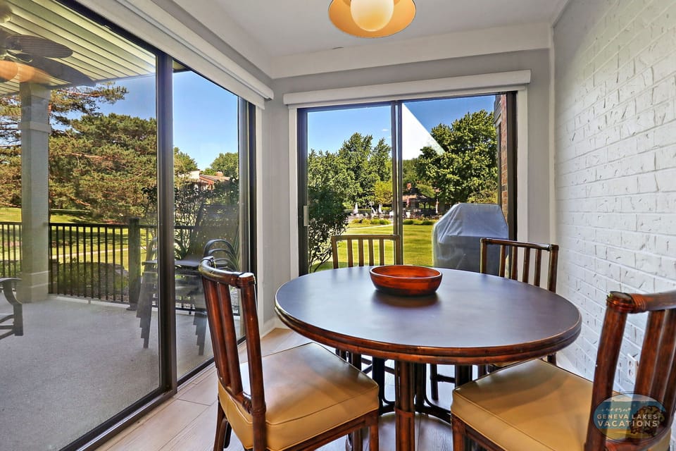 Kitchen with dining for 4.The grill in photo is NOT included in rental.
