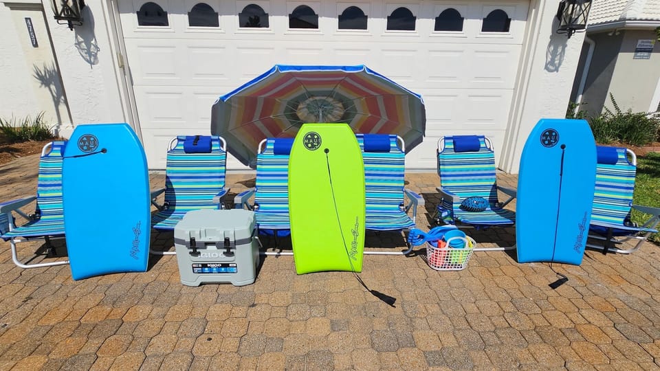 6 Beach Chairs, Umbrella, and Cooler For Perfect Beach Day