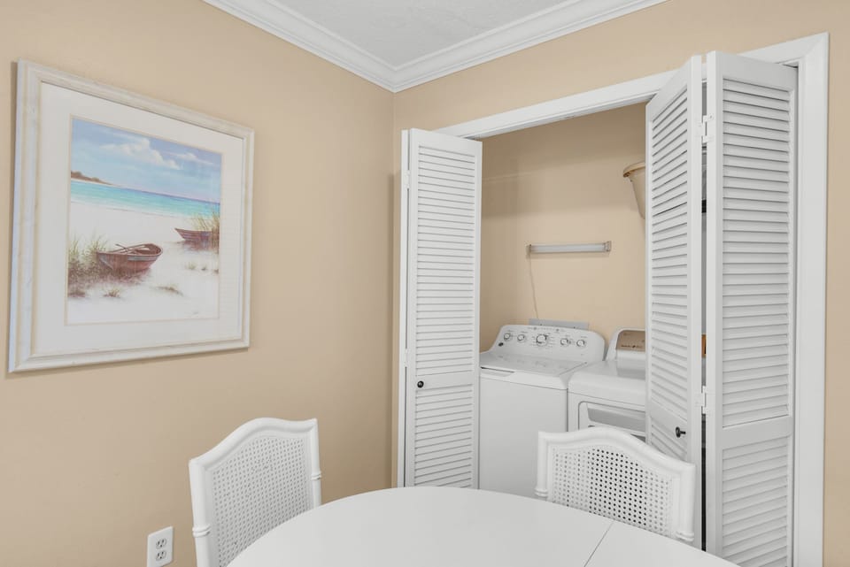 Table next to washer and dryer